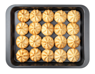 Freshly Baked Star-Shaped Cookies Arranged on a Dark Gray Baking Sheet