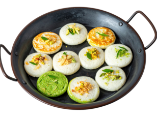Assorted Idli Cakes with Toppings in a Black Pan, Overhead View