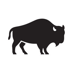 Obraz premium A striking black silhouette of a powerful bison standing in profile
