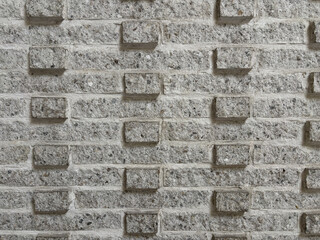 Texture - Embossed Gray Brickwork in Modern Shopping Complex Wall