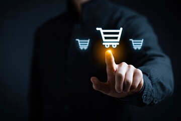 Person's finger touching glowing shopping cart icon on dark background