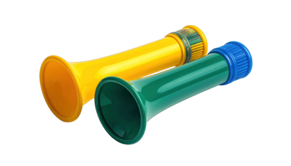 Two colorful, plastic noise makers, yellow and green, isolated on a black background