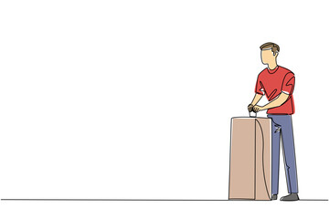 One line drawing politics concept for international event Democracy Day. Young man in shirt, upright at ballot box, symbolizes active participation, voting rights, and the democratic election process.