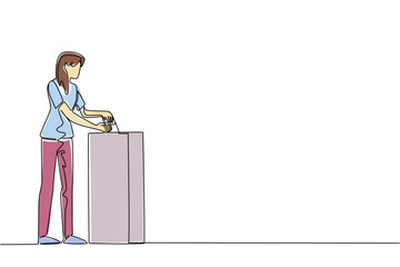 Single line drawing of a woman placing her ballot into a ballot box, symbolizing individual participation, the right to vote, and the essence of democratic elections. Democracy Day event of election