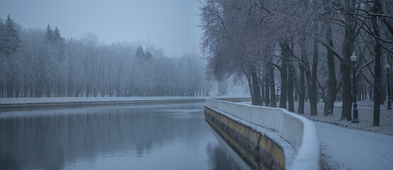 Fog by the river. Winter Minsk.
