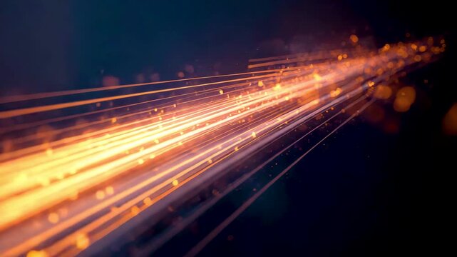 Orange light trails streaming diagonally across dark background with motion blur