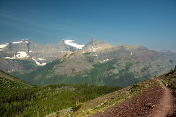Mount Cleveland And Cosley Ridge Below A Blue Sky In Glacier