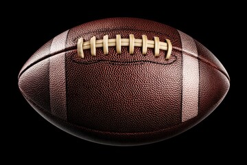 Close up of an American football highlighting its texture and details against a black background, showcasing the craftsmanship and design of the sport equipment