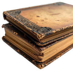 A close-up view of a stack of two antique, worn leather-bound books with ornate corner details against a black background.
