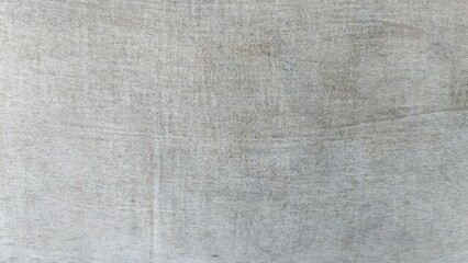 High resolution flat lay texture of grey linen fabric with fine weave for background or overlay.
