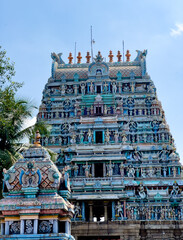The gopuram tower of Sangameshwarar Temple at Bhavani Kooduthurai in Erode district, Tamil Nadu, adorned with colorful deity sculptures and carvings.