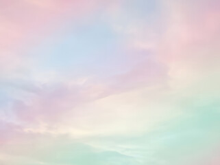 Obraz premium Soft pastel colored sky with dreamy clouds blending in a gentle gradient.