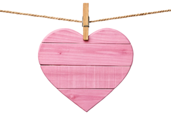 Pink wooden heart hanging on rope with clothespin, isolated on a transparent background
