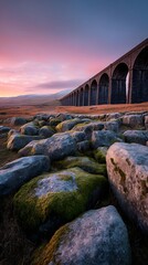 Ribblehead Viaduct at Sunrise Mossy Rocks and Pink Sky in Yorkshire Dales