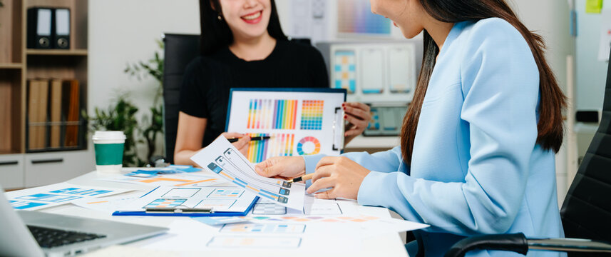 Close up view of UI developer team brainstorming on their project with laptop, smartphone and digital tablet. Creative digital development agency. - Powered by Adobe