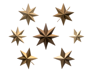 Arrangement of seven metallic, pointed star shapes on black