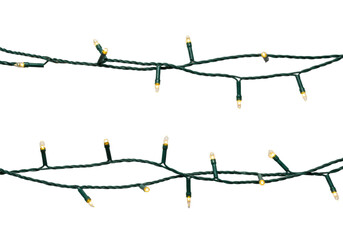 two parallel strands of golden-glow miniature christmas lights with dark green wire on a transparent background, high-contrast studio photograph. concept of minimal festive cheer