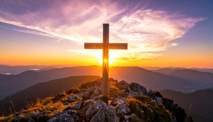 Cross on Mountain Top at Sunset
