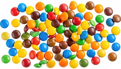 Colorful candy-coated chocolates scattered on white