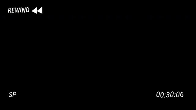 Rewind REW Analog TV Old VHS Display on black background and timecode. 4K Video