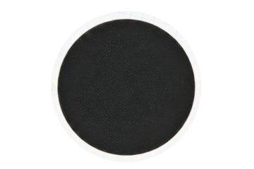 Circular black rubber patch for repairing punctured inner tubes isolated on a transparent background