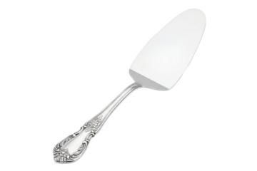 Silver cake server utensil with decorated handle for dessert isolated on a transparent background