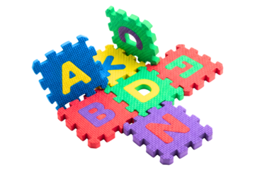 Colorful foam alphabet puzzle mat pieces with letters for kids isolated on a transparent background