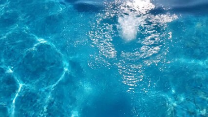 P193-Blue water surface ripples and waves background. Water waves flowing with light reflections swimmin 4K 10s