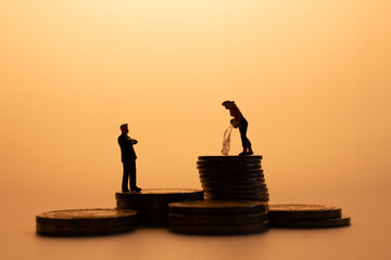 Money Laundering and Power Imbalance Concept with Miniature Figures