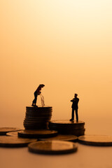 Financial Corruption and Wealth Control Symbolized by Stacked Coins