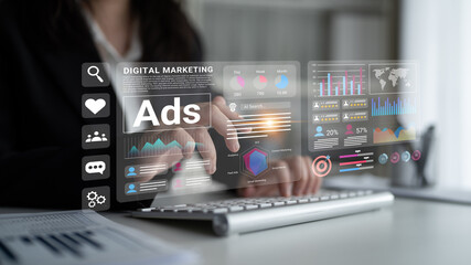 A business professional engages with advanced digital marketing tools and analytics, emphasizing the importance of data-driven strategies in modern advertising efforts. Gantry