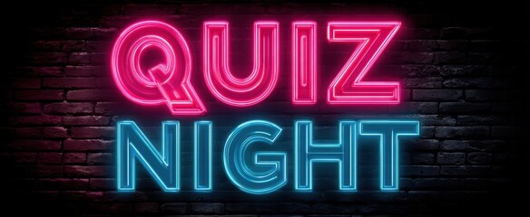The Quiz Night Neon Sign Against Dark Brick Wall Illuminated in Pink and Blue