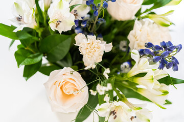 Elegant White Rose Bouquet Adorns a Beautiful Vase