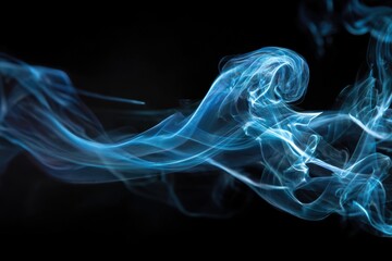 Obraz premium Blue smoke swirls in the dark background, creating flowing shapes and patterns in the air during a quiet moment at night