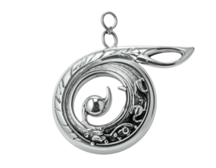 Ornate silver pendant with intricate swirling design and textured details