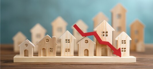 The Houses With Falling Red Arrow Representing A Declining Real Estate Market Trend