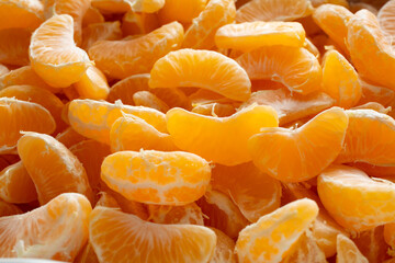 A closeup view of a pile of mandarin segments.