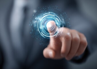 Finger touching glowing blue digital interface projection in dark setting.