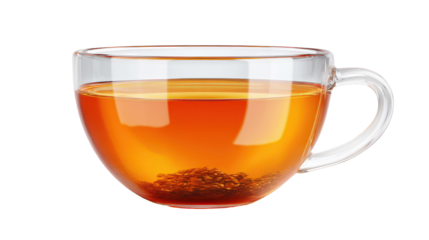 Hot tea with loose leaves in clear glass cup placed on white background during afternoon