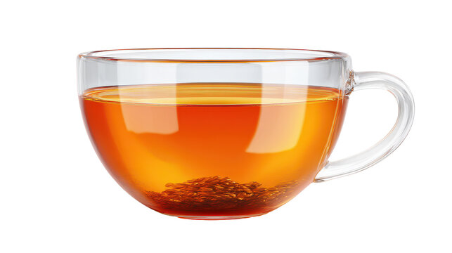 Hot tea with loose leaves in clear glass cup placed on white background during afternoon