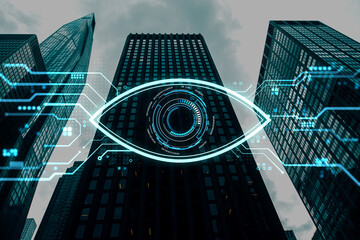 Futuristic holographic computer vision eye symbol overlay on city skyscrapers background representing surveillance technology concept.