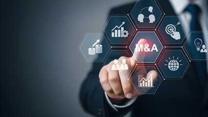 Close-up of a businessman's hand interacting with a M&A infographic on a touchscreen with various business icons on a dark background.