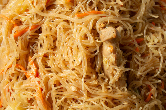 A top down view of a pile of pancit bihon, as a background.