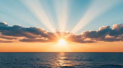 A stunning sunrise over the ocean, showcasing radiant beams of light piercing through soft clouds, Ideal for travel, nature, or relaxation themes in marketing materials or inspirational content,