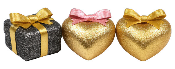 Three golden hearts and a gift box on a white background