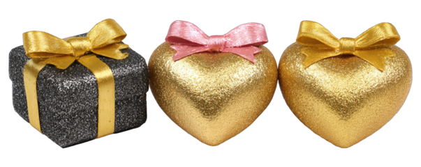 Three golden hearts and a gift box on a white background