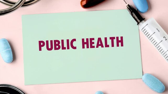 The words PUBLIC HEALTH gradually appear on a light green card surrounded by a syringe, pills, and stethoscope parts on a light pink background