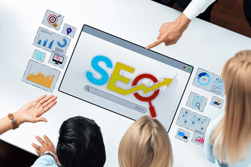 This image captures a collaborative session focused on SEO strategy, showcasing interactive analysis and visualization for enhancing online presence and driving growth. Trope