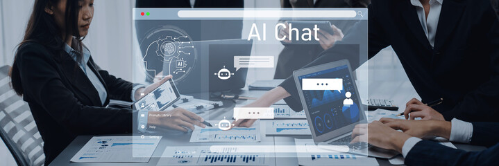 Professionals engage in a collaborative business discussion, utilizing AI chat technology to explore innovative digital solutions in a modern office environment. Trope