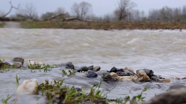 Low angle view of flah flood water, close up, shallow depth of field